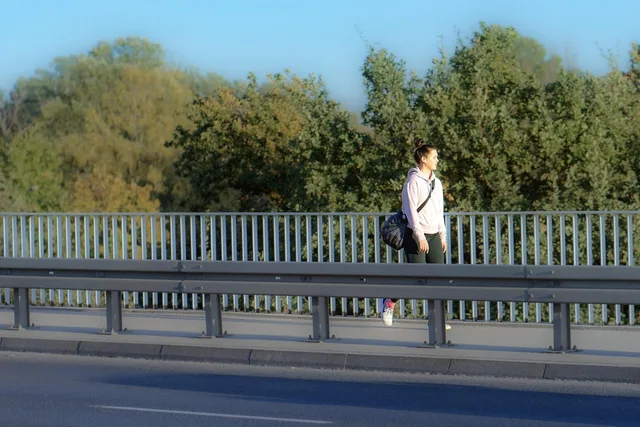sidewalk, bridge, pedestrian, walking, urban, trees, autumn, lifestyle, nature. Best walking season for downtowns: shoulder months over summer heat
