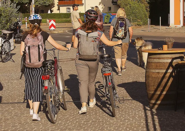 women, bicycles, pedestrian zone, shopping, street, downtown, urban, bike ride. 5 things first-time visitors miss about car-free weekends