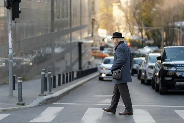 elderly man, crossing the street, crosswalk, pedestrian, traffic, urban, city, pedestrian lane, grandparents, grandpa. Newcomers often misjudge how a walking tour business actually works