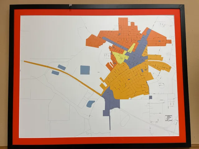 2012 Tallulah Zoning map in the Tallulah Municipal Building in Tallulah, Louisiana. How to use a city's zoning map to find walkable neighborhoods before a trip